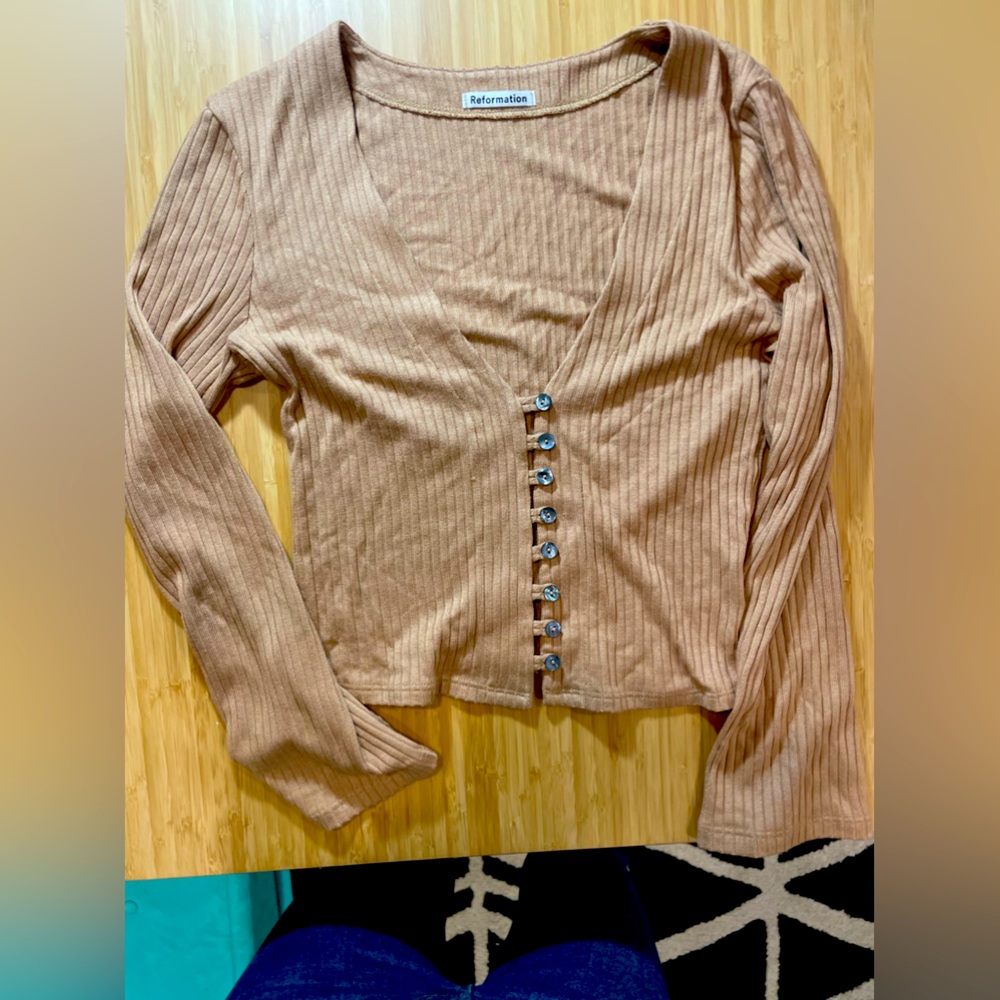 Reformation cardigan style top.